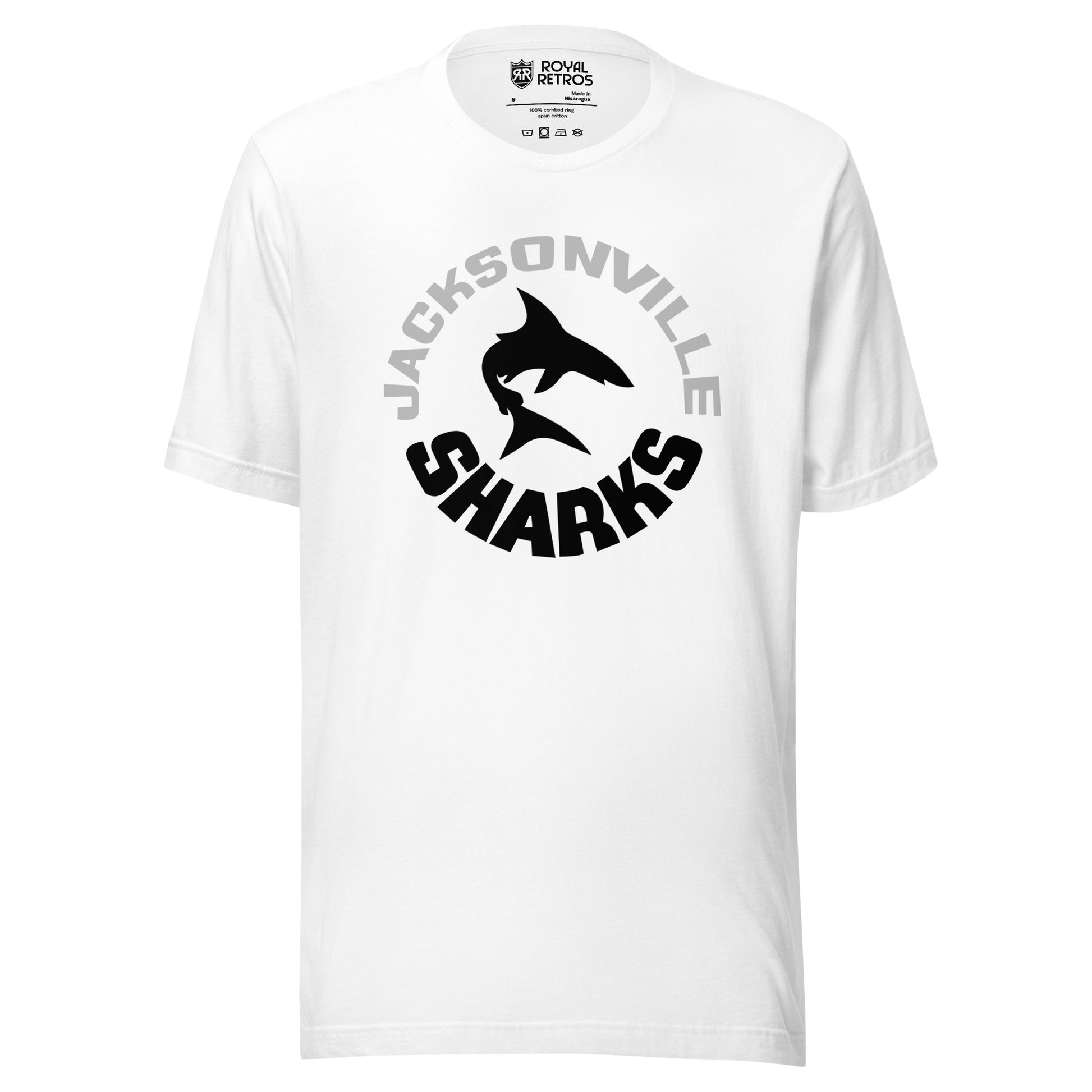 Jacksonville Sharks World Football League WFL T-shirt. White. JACKSONVILLE in white arched above, SHARKS in black arched up below. Silhouette of shark swimming in center. Royal Retros 
