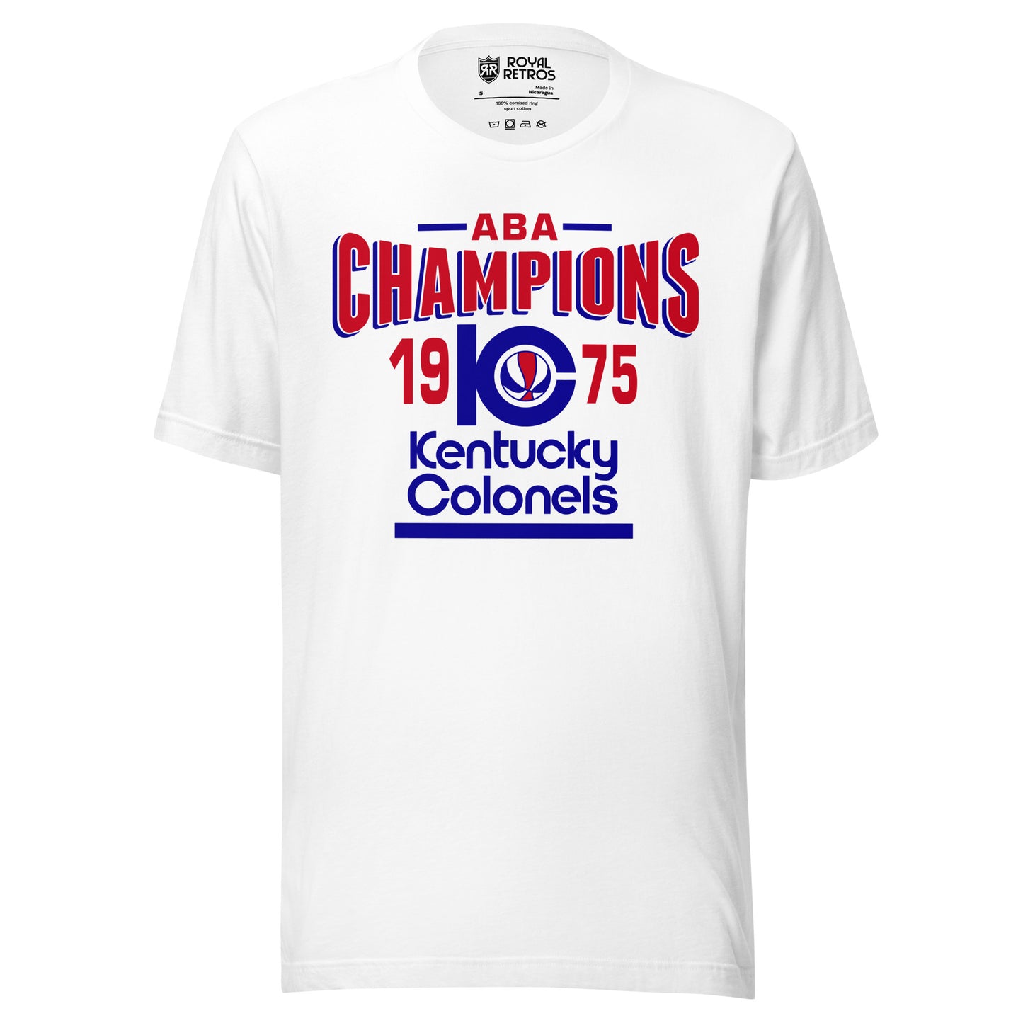 Kentucky Colonels ABA 1975 Champions T-shirt. White. ABA in red with blue lines on either side. Champions in red bent in in center/ K with C coming out of it and red, white, and blue basketball inside. 19 in red to the left pf the KC and 75 to the right. Kentucky in blue below, Colonels in blue below that, blue line below that. Royal Retros