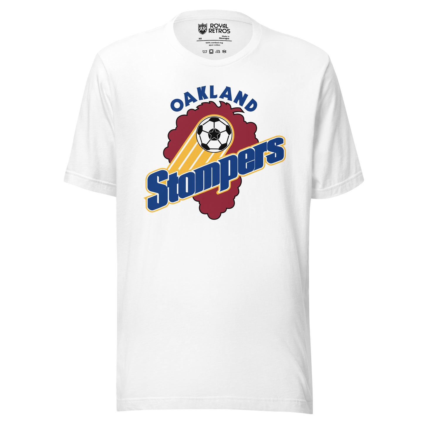 White t-shirt with an Oakland Stompers graphic: a gold-trailed soccer ball above bold blue 'Stompers' script