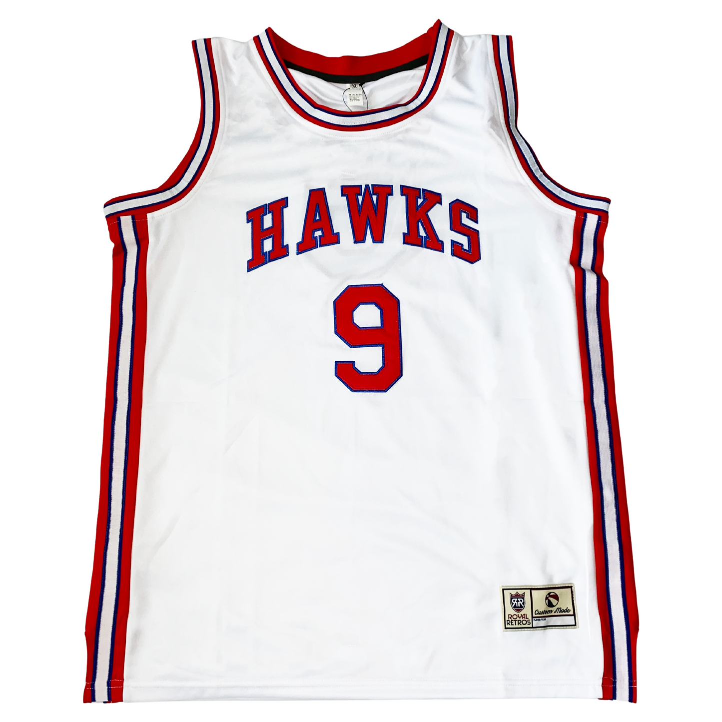 1960 St. Louis Hawks basketball jersey white. HAWKS in red with blue trim in block letters arched across chest. #9 in red with blue trim below. Red, white, and blue trim up sides, around shoulders and neck. Royal Retros. 