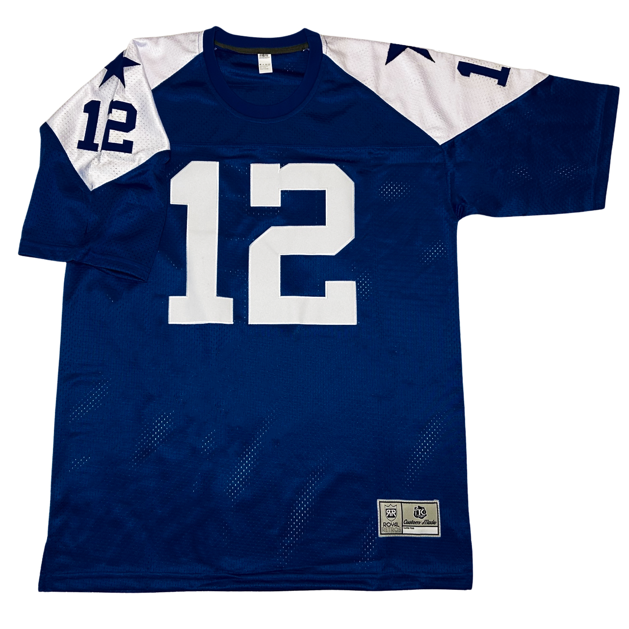 1960s Dallas Cowboys football jersey. Blue with white shoulders. White #12 large on chest. Small blue #12 and blue star on shoulders. Royal Retros