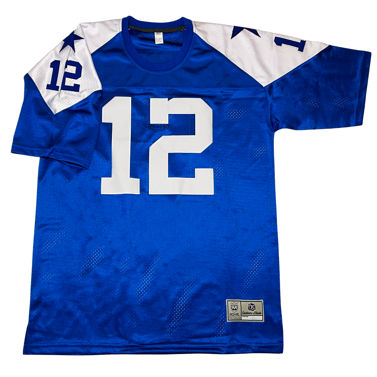 1960s Dallas Cowboys jersey. Blue with white shoulders. Large white #12 on chest. Blue #12 and blue star on shoulders. Royal Retros