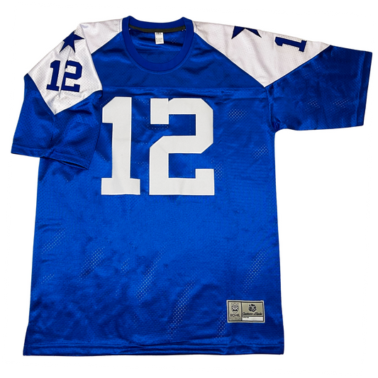 1960s Dallas Cowboys jersey. Blue with white shoulders. Large white #12 on chest. Blue #12 and blue star on shoulders. Royal Retros