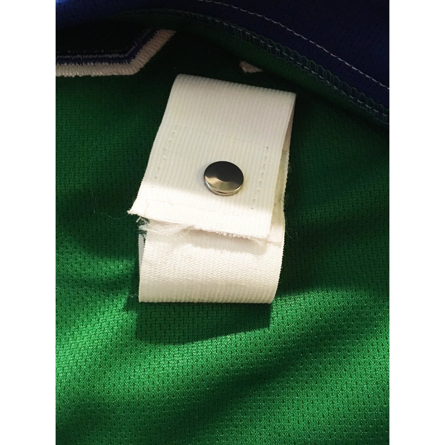 1970 California Golden Seals green jersey fight-strap detail — Royal Retros