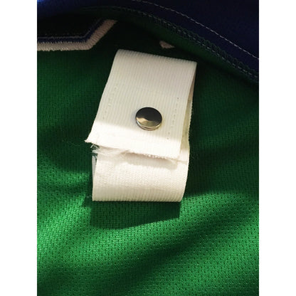 1970 California Golden Seals green jersey fight-strap detail — Royal Retros