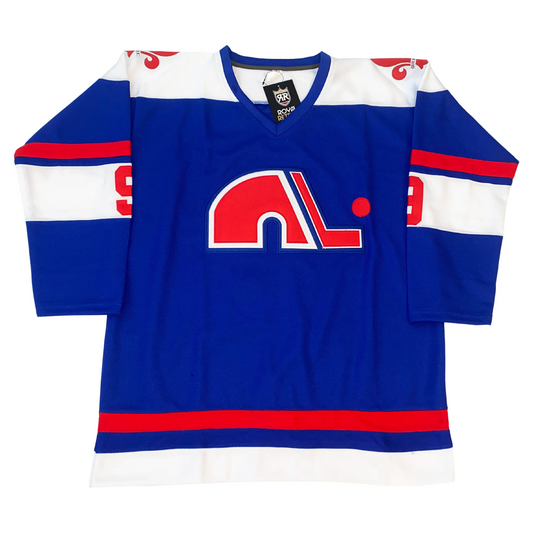 1974 WHA Quebec Nordiques blue jersey with fleur-de-lis trim and N-and-stick crest — Royal Retros