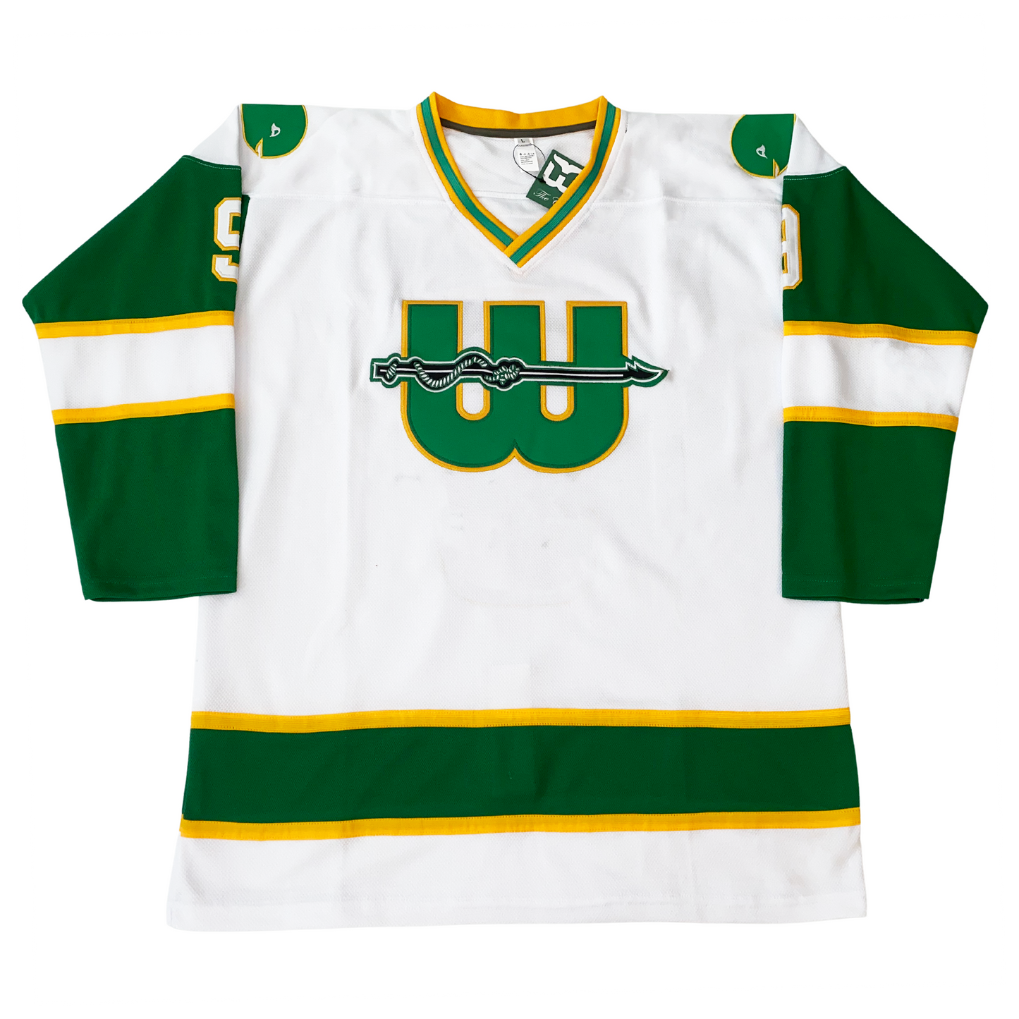 New England Whalers Jersey 1975 white. Green sleeves with gold white and gold band. Green and gold trim on neck. Green band on waist with gold trim. W in green on chest outlined in gold with black and white harpoon across chest  Royal Retros