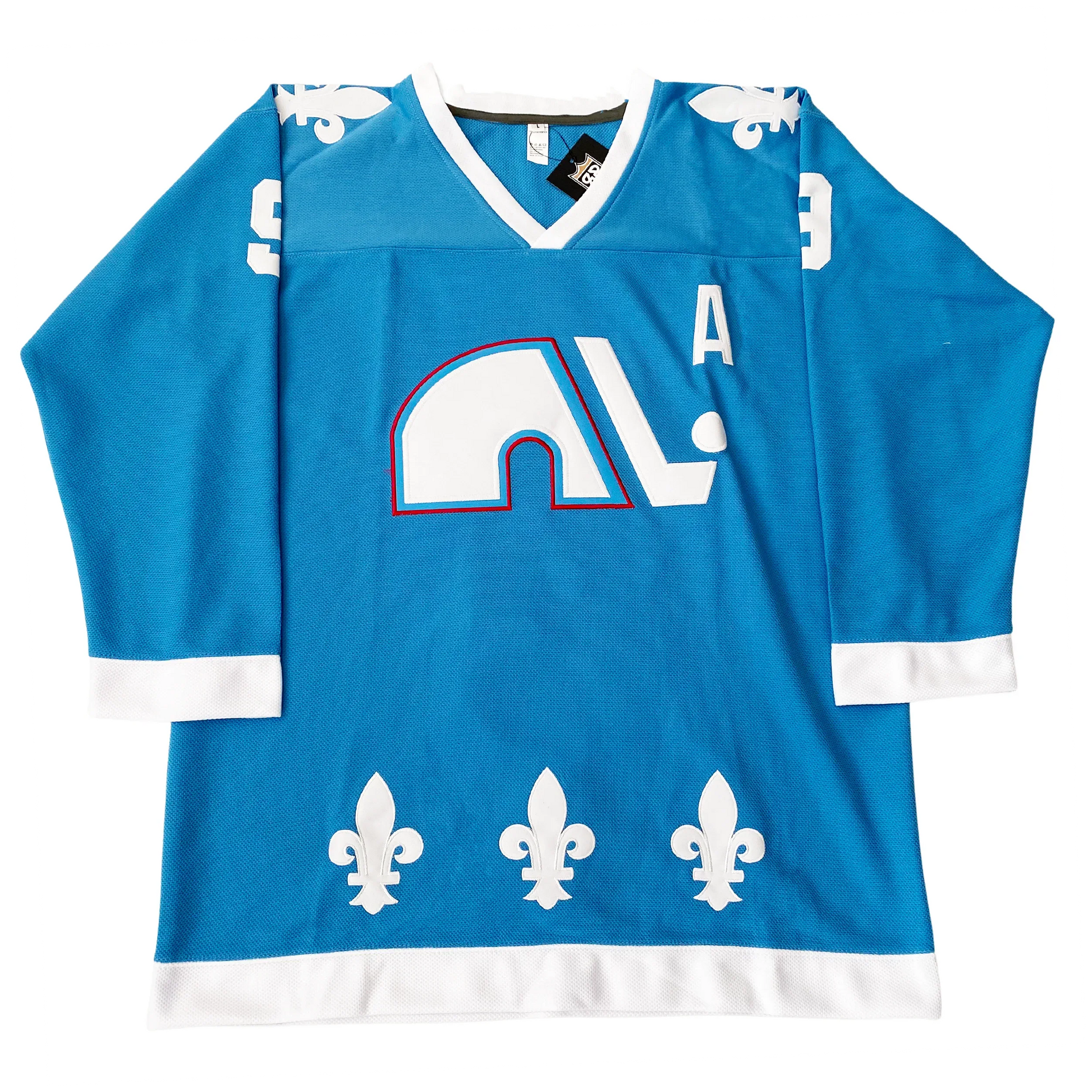 1976 WHA Quebec Nordiques blue jersey with white fleur-de-lis and N-and-stick crest — Royal Retros
