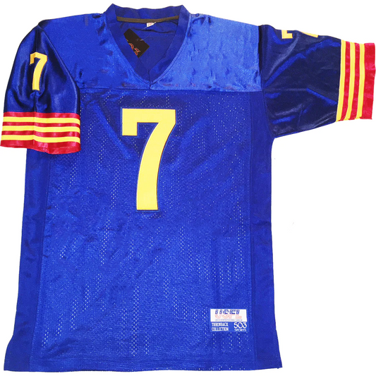 1983 Arizona Wranglers USFL Jersey blue.  6 alternating red and gold bands at sleeve ends. Gold #7 large on chest, small on sleeves. Royal Retros