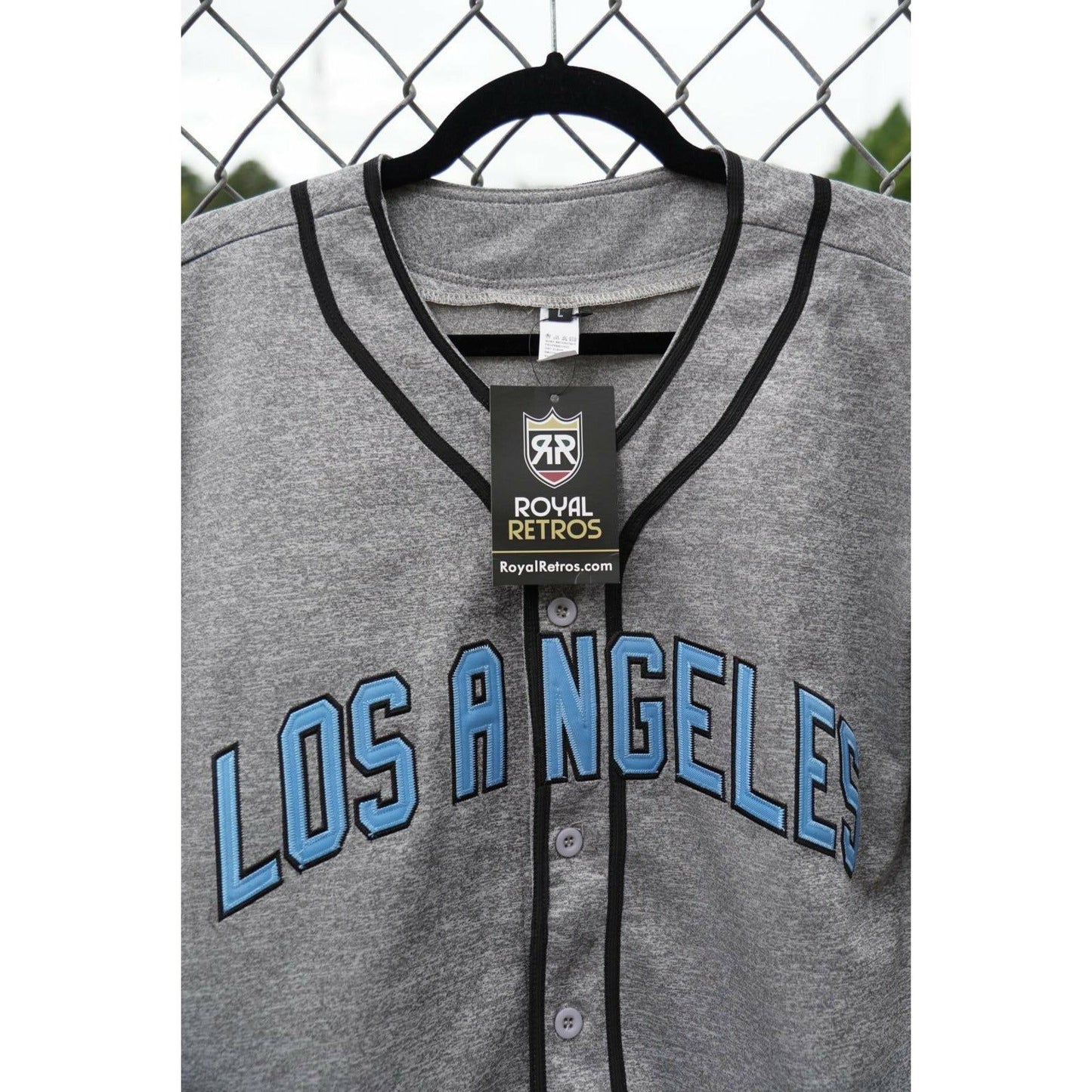 Close up of pepper gray Los Angeles White Sox baseball jersey. Royal Retros