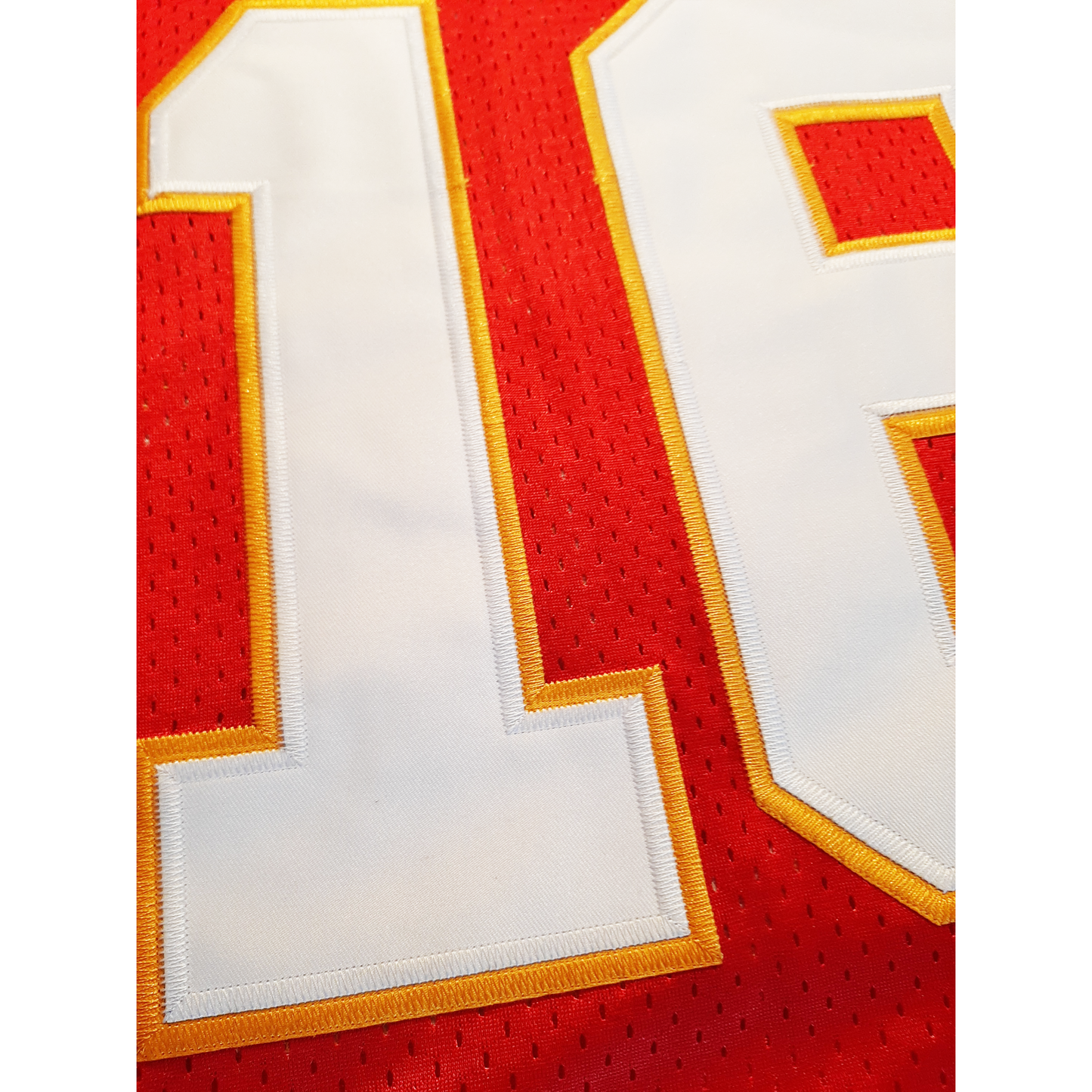 1960s Dallas Texans football jersey red #18 in white with gold trim close-up. Royal Retros