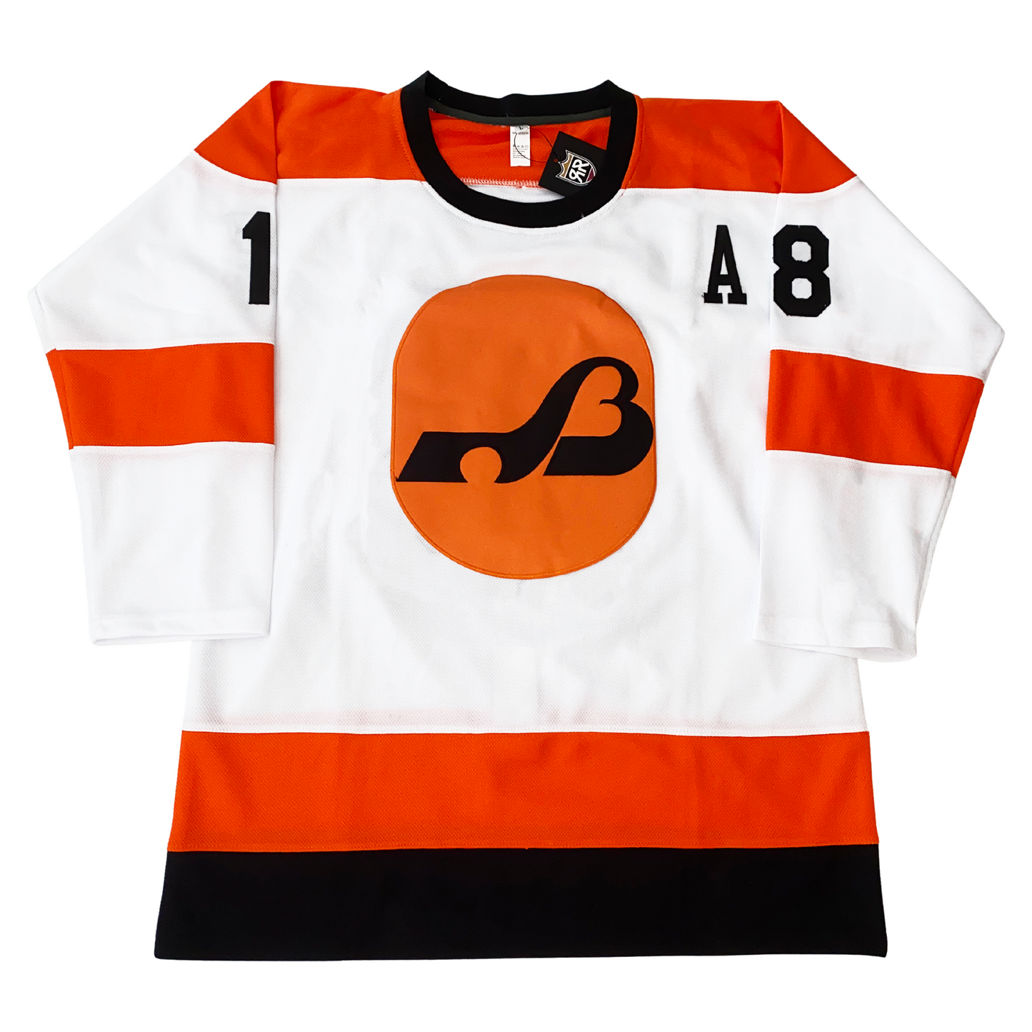 Baltimore Blades Jersey white with B logo, White. Orange shoulders. Black collar. Orange band mid-sleeve, orange and black band around waist. Logo on chest consisting of round orange background, stylized B with hockey blade coming off left side of letter, Alternate captain A in black on upper left chest. #18 black on shoulders.  Royal Retros