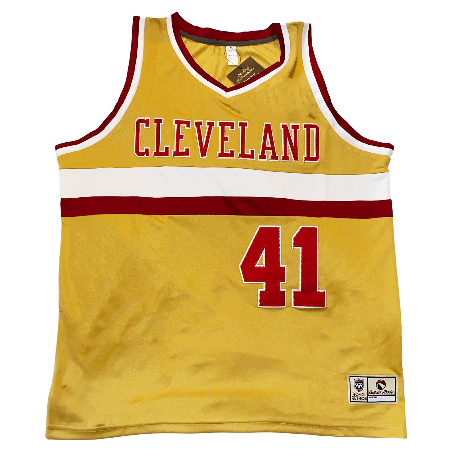 Cleveland Basketball Jersey wine and gold. Gold jersey. Red and white  trim on shoulders and neck. Cleveland across chest in red with white trim. White and red band below. #41 below right in red with white trim. Royal Retros