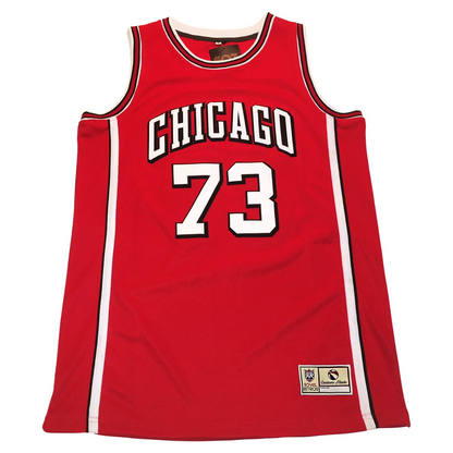 Chicago Basketball Jersey. Red tank top. CHICAGO in white block letters with black outline arched across the chest, large white number 73 with black outline below. White and black trim at the shoulders and side panels.