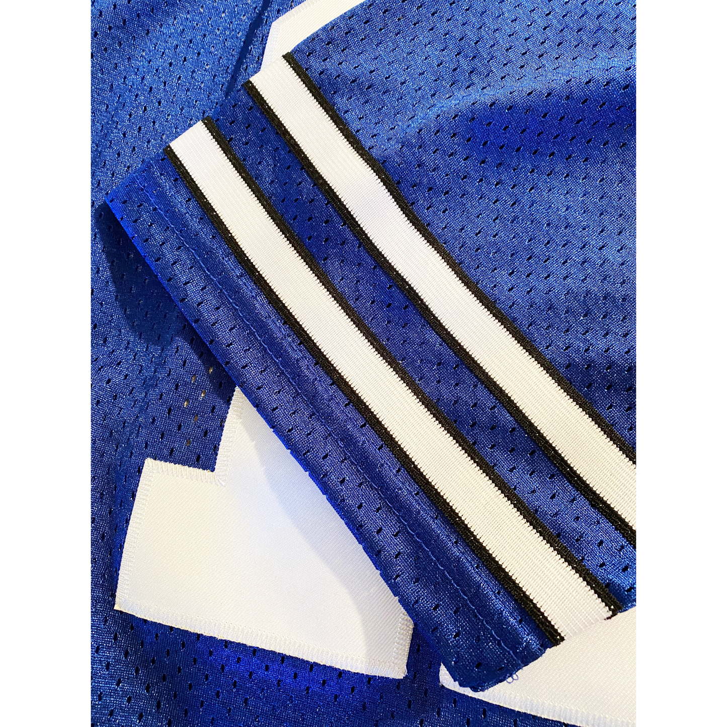 Blue mesh Dallas Rockets Jersey with white stripes and heavyweight sewn tackle twill
