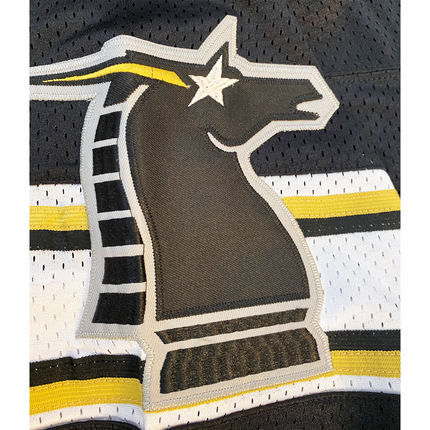 New York/New Jersey Knights Jersey close-up logo on black jersey Royal Retros