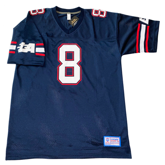 LA Express USFL Jersey dark blue. Red , blue, white blue, and red trim on shoulders, with LA with swoosh marks logo on shoulders. #8 white with red trim large on chest, small on shoulders. Royal Retros 