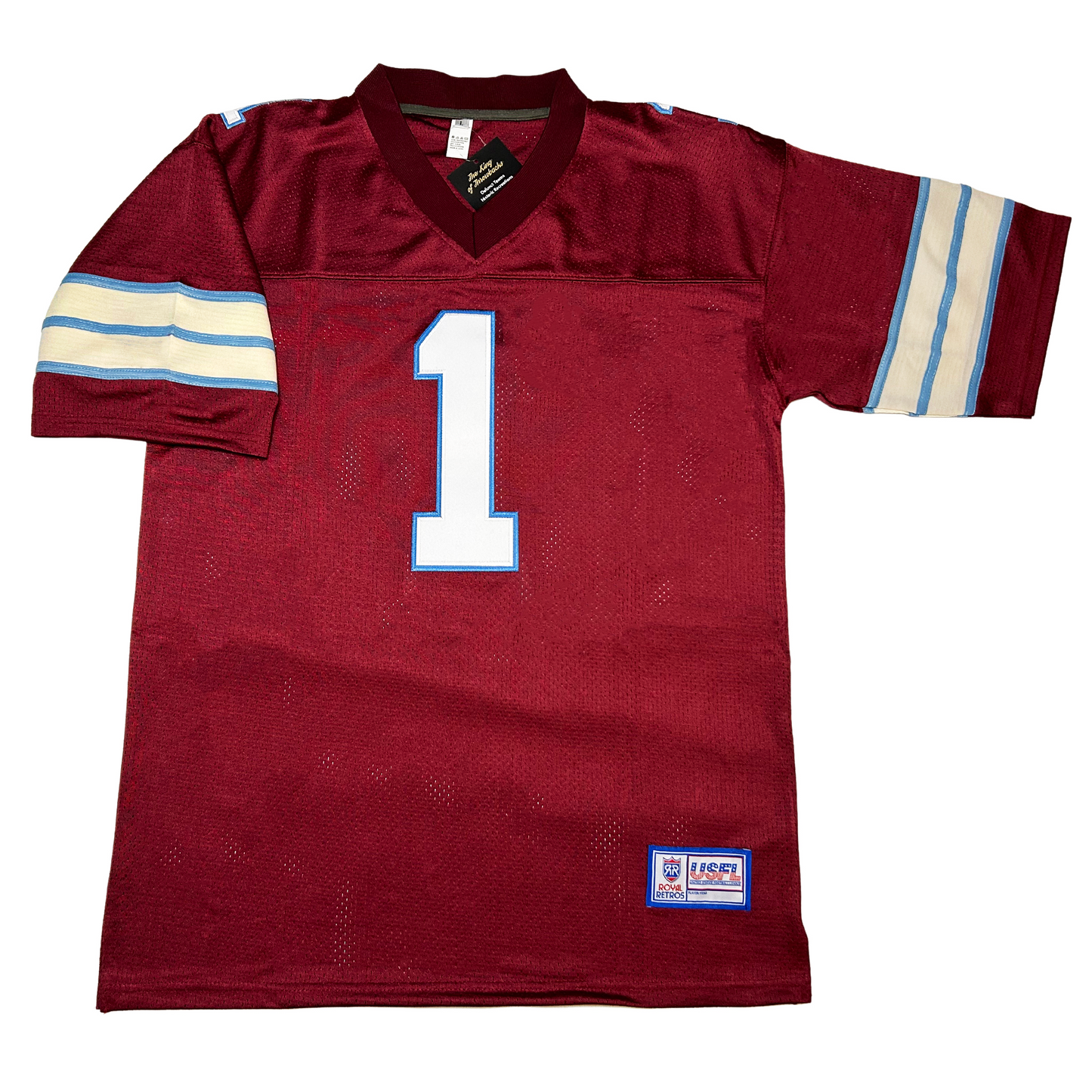 Michigan Panthers USFL Jersey. Purple. Thin blue, thick white, thin blue, thick white, thin blue bands just above sleeve ends. #1 purple in white with blue trim large on chest.  front Royal Retros