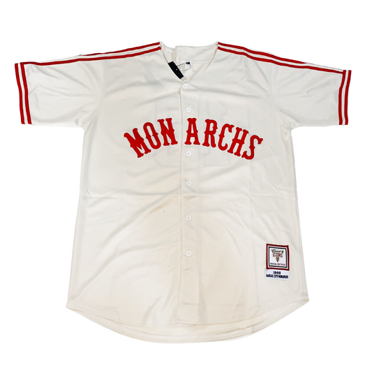 Monarchs NLB Jersey white with red trim on shoulders and sleeve ends. Monarchs across chest in red. Royal Retros