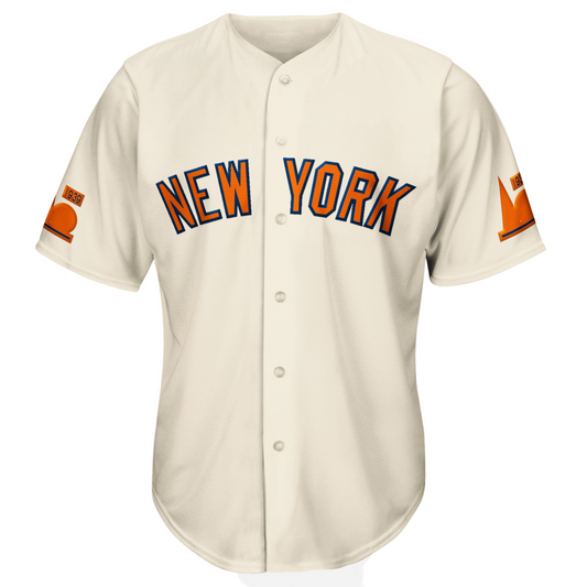 Cream-colored baseball jersey with orange lettering from York Regional Collection, sewn tackle twill