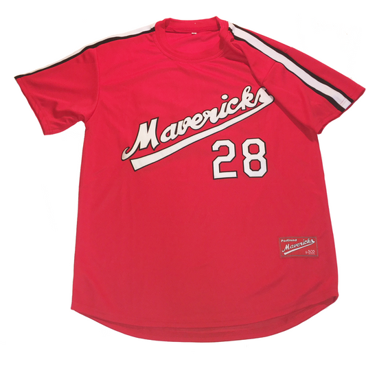 Portland Mavericks red baseball jersey. Black white and black bands across shoulders. Mavericks in cursive, angled across chest in white with black trim and text tail. #28 below right in white with black trim. Royal Retros