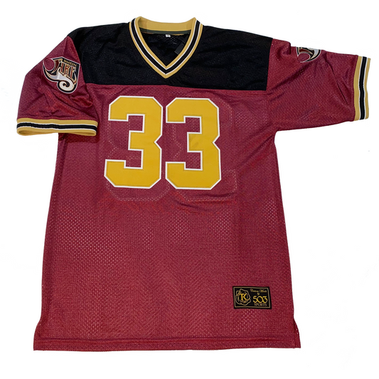 Rhein Fire WLAF Jersey maroon. Black shoulders. Gold, white, black, white gold collar and sleeve ends.  Gold #33 with white trim large on chest. Royal Retros