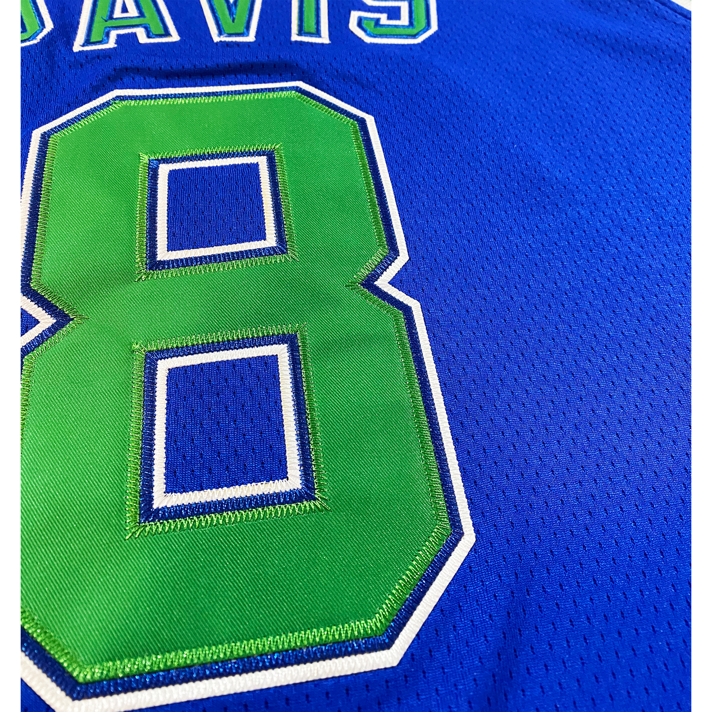 Blue San Diego Sails Jersey featuring a vibrant green number eight design