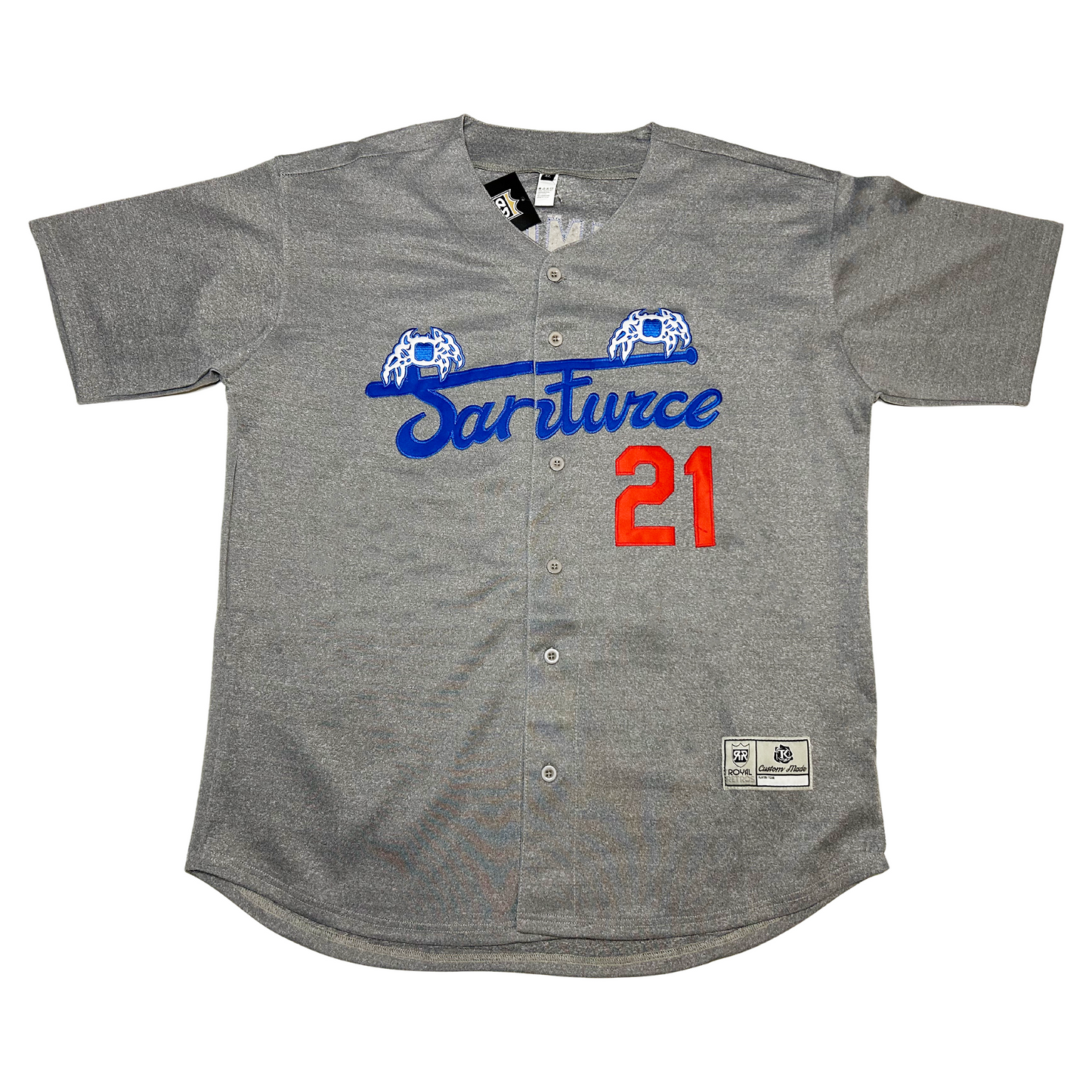 Santurce Cangrejeros button=up baseball Jersey pepper gray. Santurce in bluecursive  across chest. Blue bat across top with blue crabs with white detail on either end.  #21 in red to the bottom right. Royal Retros