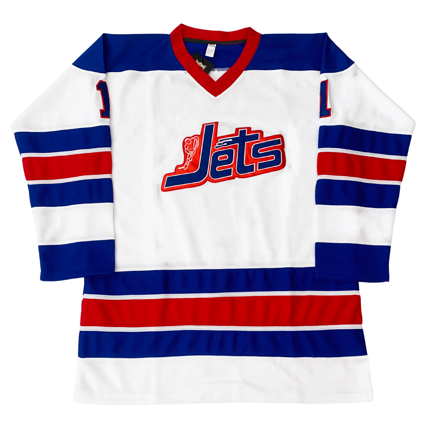 WHA Jets Jersey white with blue shoulders and red collar. Jets  in blue with red shadow across chest, skater in white to left of "J" Blue, red, blue bands with white trim separating red and white, mid-sleeve and above waist.  Royal Retros